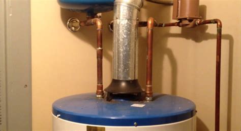 water heater leaking from top seam|Water Heater Leaking from Top: Causes and Solutions